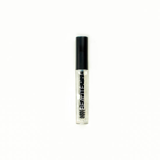 Translucent. Can be used alone to tame brows and to set brows after being filled in.