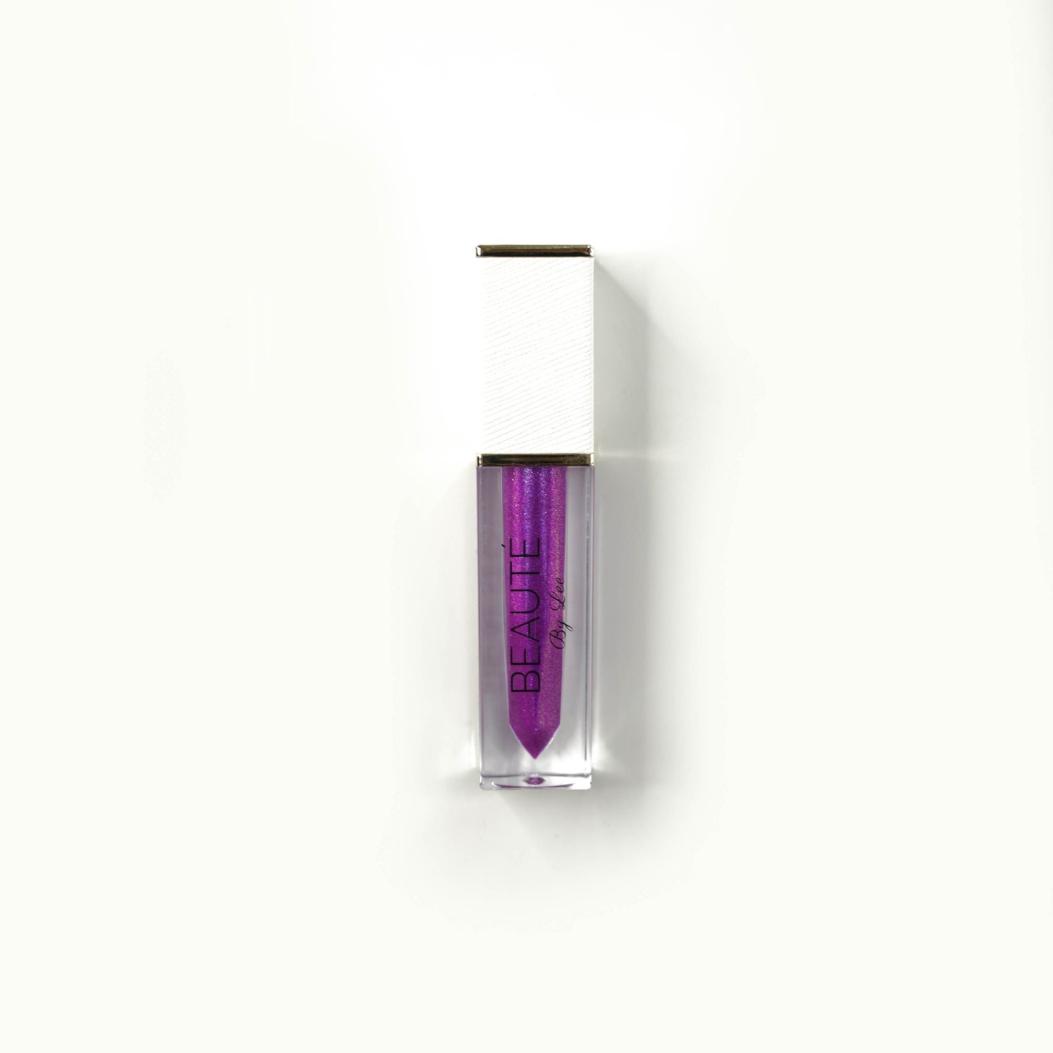 A purple iridescent finish Lip Gloss